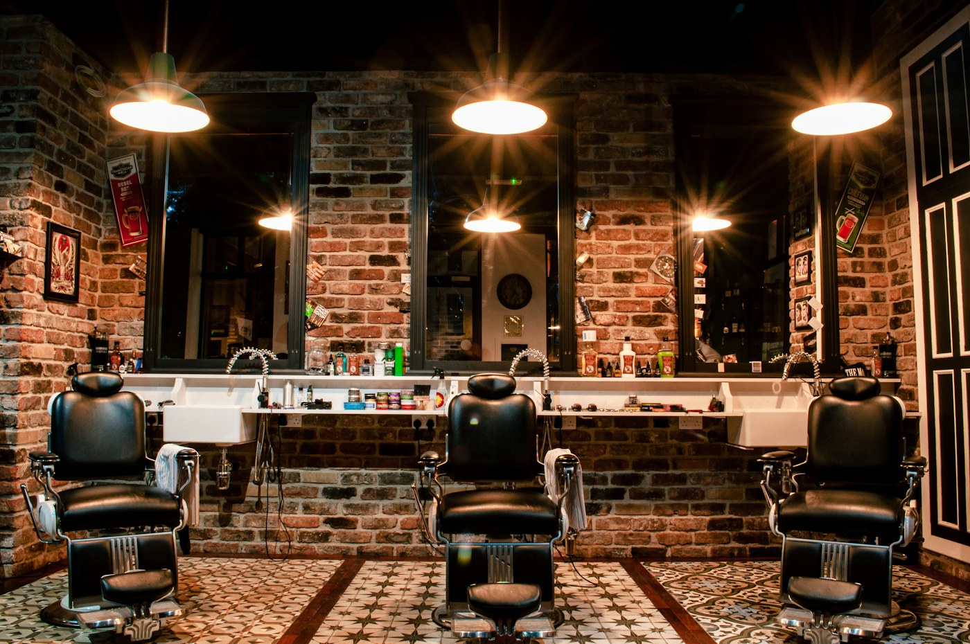 Illustrative barbershop interior with vintage chairs and warm lighting; not RS Barbershop